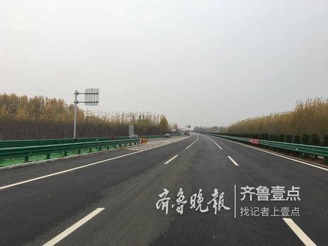 g220长清绕城段月底通车,为首条设置停车区的国道