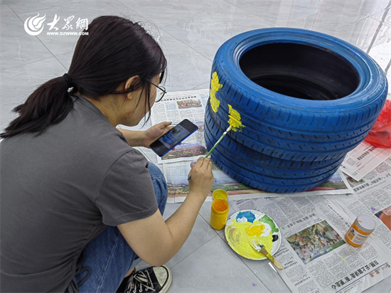 谈球吧体育有淄有爱 张店和平街道：废旧轮胎再利用 美丽家园共装扮(图1)